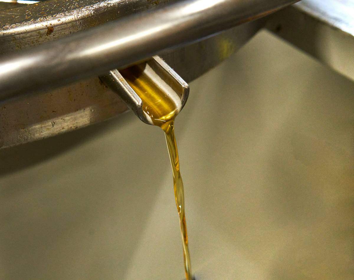 Close-up of the good oil face oil bottle showing argon-flushed packaging and ingredient clarity